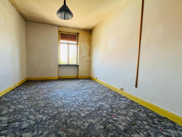 Gros potentiel pour cet appartement avec grenier attenant