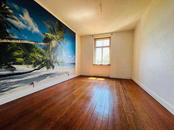 Gros potentiel pour cet appartement avec grenier attenant