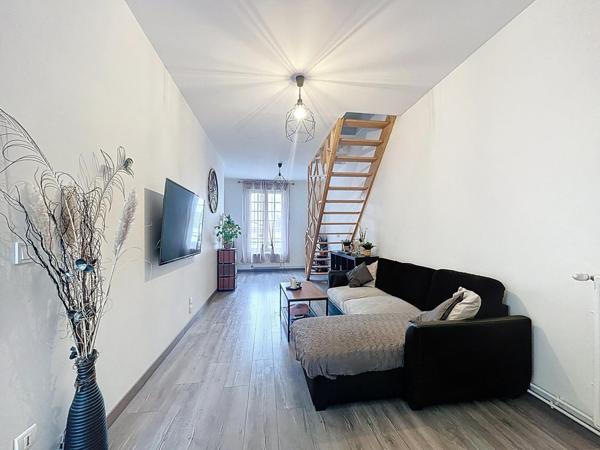 Duplex 3 pièces entièrement rénové avec jardin et cave