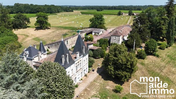 Chateau avec dépendances sur 23 hectares