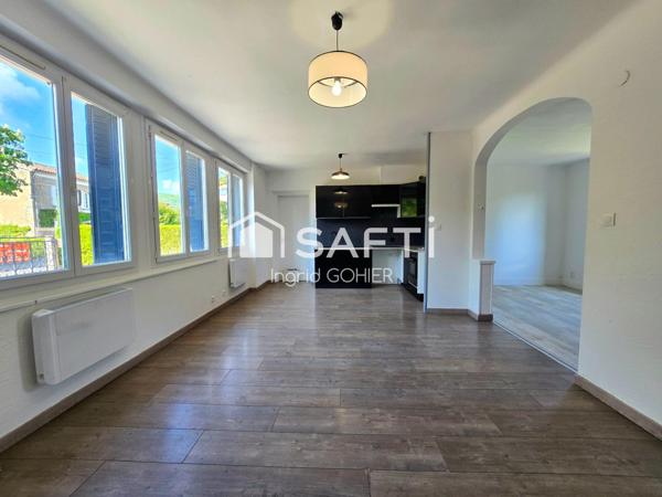 Idéalement située, proche commodités avec jardin et garage