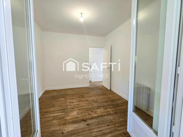 Idéalement située, proche commodités avec jardin et garage