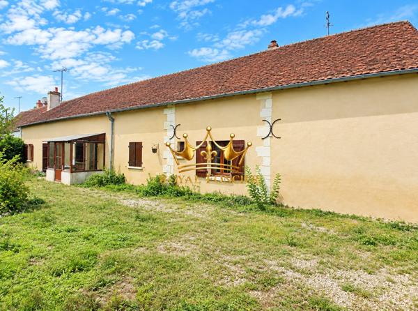 Longère avec étang en campagne