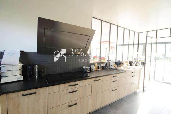 Maison 7 pièce(s) 4 chambre(s) 225 m²