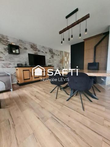 Coup de coeur assuré pour cette maison semi plain pied sur sous sol