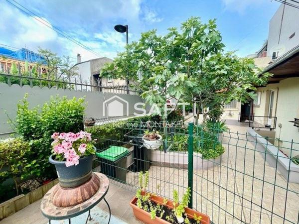 Maison traditionnelle de plain pied avec cave et garage