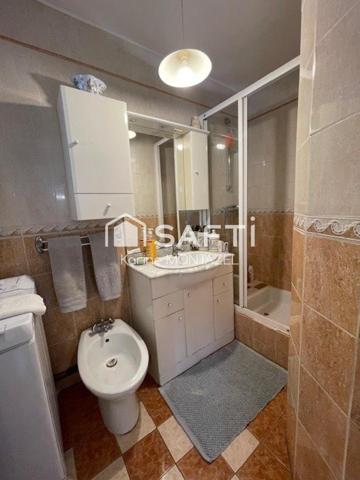 Maison traditionnelle de plain pied avec cave et garage