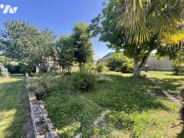 Maison rénovée avec grand terrain et potentiel constructible – Proche centre de Laloubère