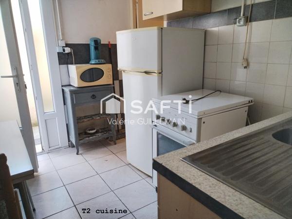 Maison de 200m² avec 4 chambres, garage piscine + local commercial tout commerce + Studio