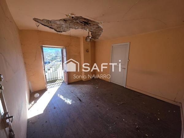 Maison de village avec grange attenante et jardinet - Gros potentiel