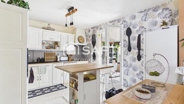 Maison familiale avec véranda et jardin clos