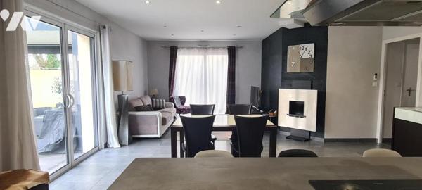 Maison de plain-pied de 89 m² sur un terrain clos d'environ 408 m² 