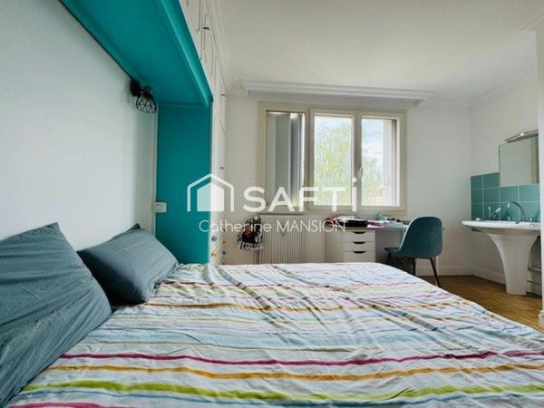 A vendre à Reims, appartement traversant, lumineux et spacieux, 4 chambres , balcons, cave et garage