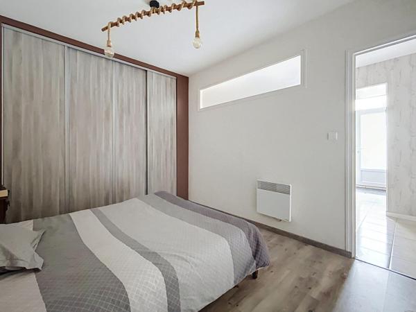 Equeurdreville - Appartement de 109 m² avec cour privative et stationnement