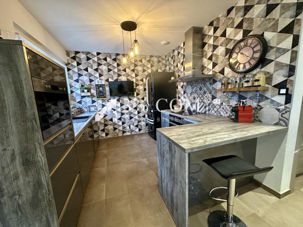 Maison 6 pièce(s) 4 chambre(s) 125 m²