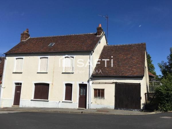 Maison avec jardin et garage à rénover