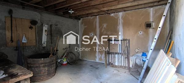 Maison avec jardin et garage à rénover