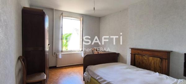 Maison avec jardin et garage à rénover