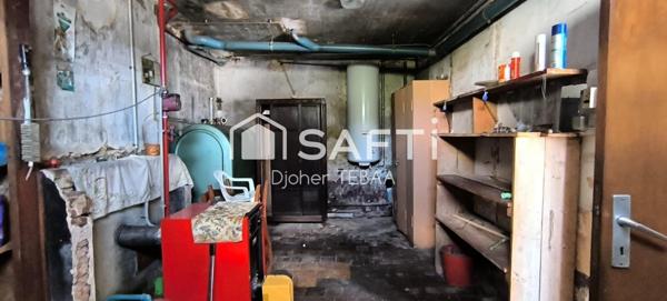 Maison avec jardin et garage à rénover