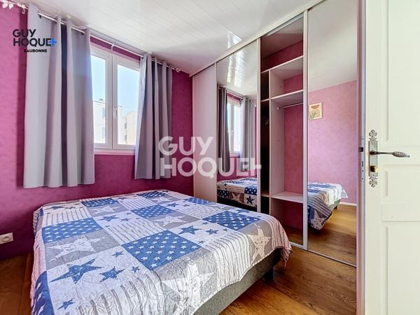 Appartement à vendre de 4 pièces - 3 chambres de 67.82m² avec place de parking et cave