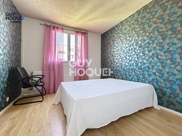 Appartement à vendre de 4 pièces - 3 chambres de 67.82m² avec place de parking et cave