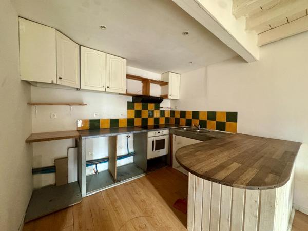 Immeuble de rapport : 6 appartements + local loué
