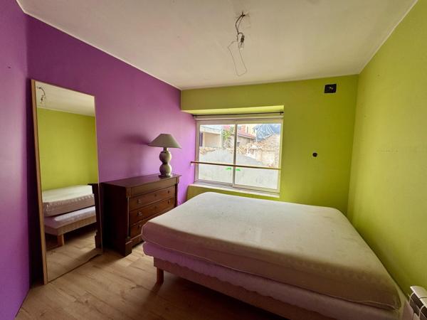 Immeuble de rapport : 6 appartements + local loué