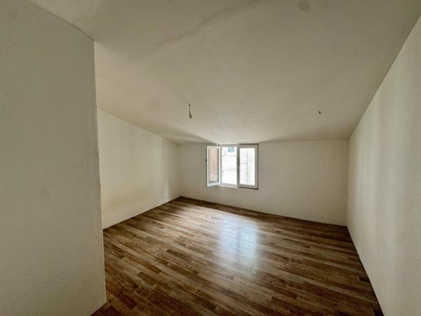 Immeuble de rapport : 6 appartements + local loué