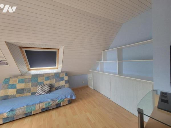 Maison familiale avec piscine et parc paysager – proche centre-ville