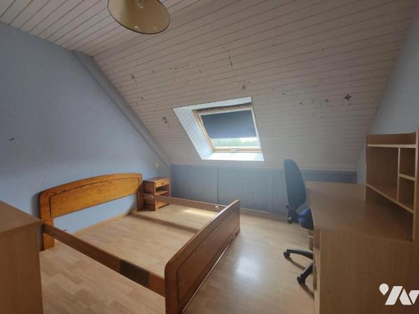 Maison familiale avec piscine et parc paysager – proche centre-ville