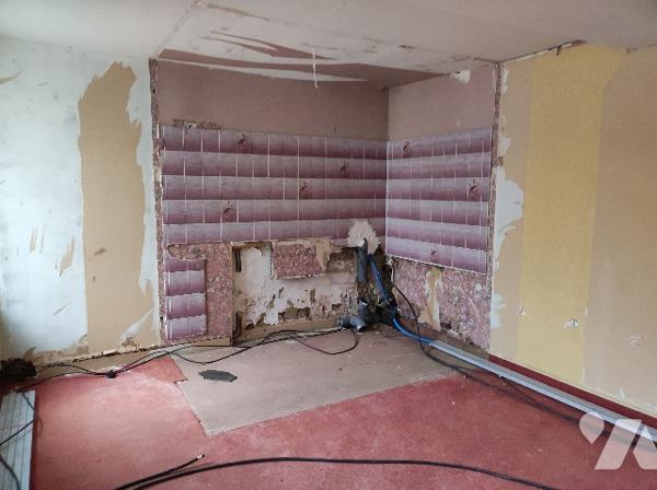 Un immeuble (ancien Hôtel – Restaurant)