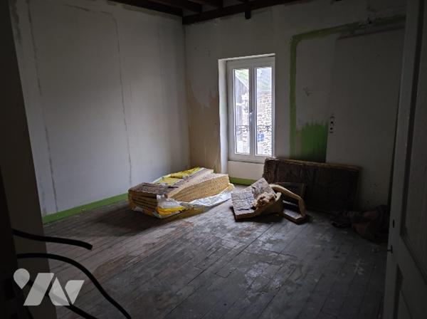 Un immeuble (ancien Hôtel – Restaurant)