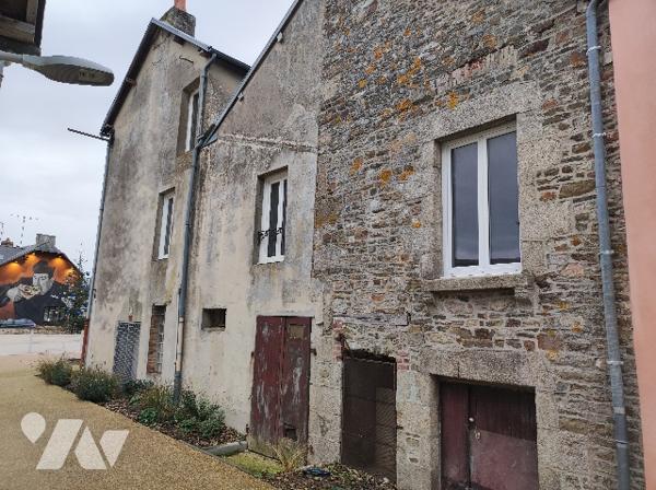 Un immeuble (ancien Hôtel – Restaurant)