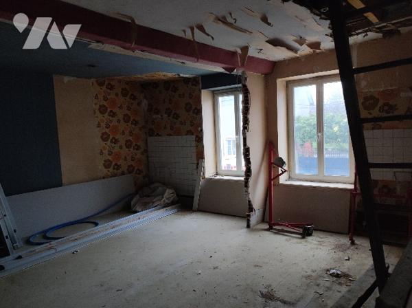 Un immeuble (ancien Hôtel – Restaurant)