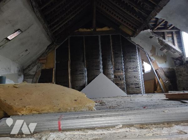 Un immeuble (ancien Hôtel – Restaurant)