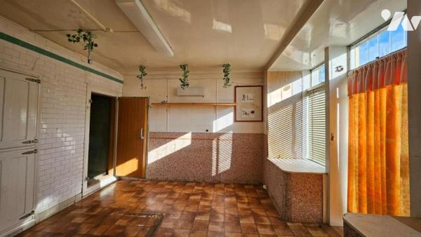 A vendre à VALENCE-EN-POITOU (86700), COUHE, Une maison de ville avec cour et garage