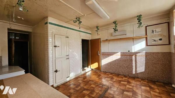 A vendre à VALENCE-EN-POITOU (86700), COUHE, Une maison de ville avec cour et garage