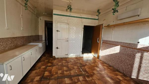 A vendre à VALENCE-EN-POITOU (86700), COUHE, Une maison de ville avec cour et garage