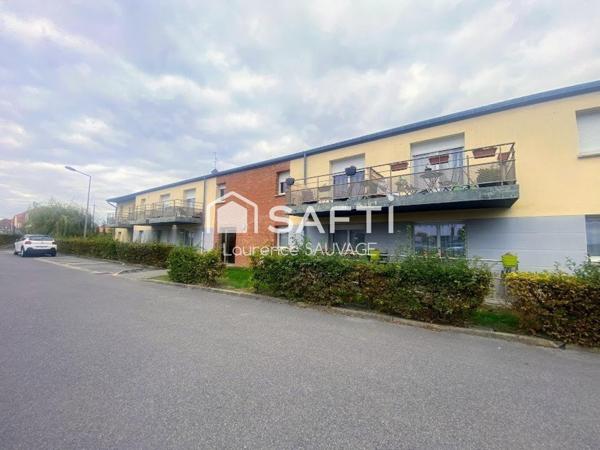 Appartement T2 en rez de jardin avec place de parking