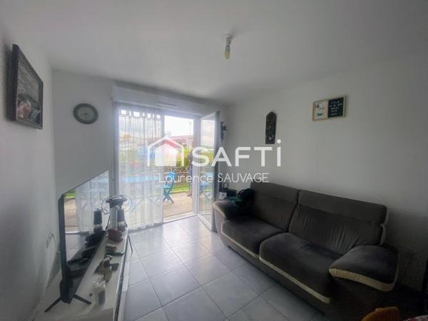 Appartement T2 en rez de jardin avec place de parking