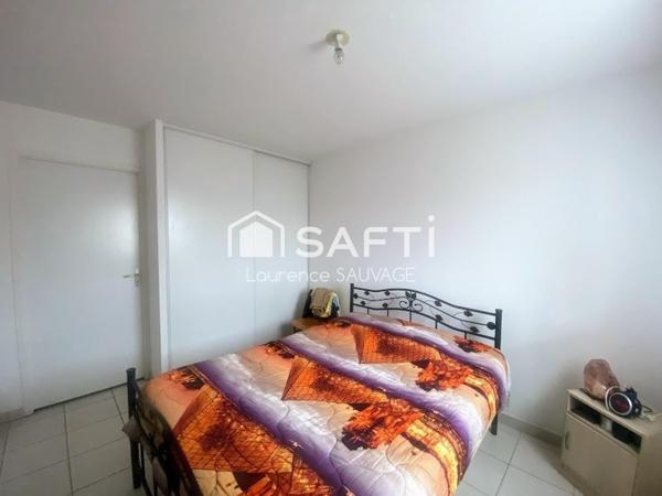 Appartement T2 en rez de jardin avec place de parking