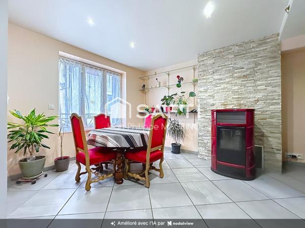 Maison familiale rénovée avec 4 chambres, garage et jardin