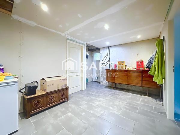Maison familiale rénovée avec 4 chambres, garage et jardin