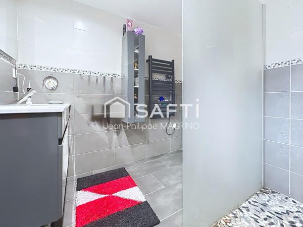 Maison familiale rénovée avec 4 chambres, garage et jardin
