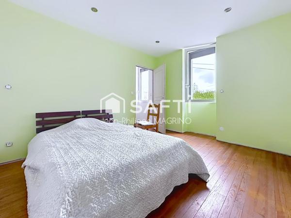 Maison familiale rénovée avec 4 chambres, garage et jardin