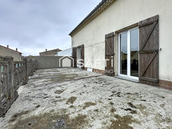 Maison familiale rénovée avec 4 chambres, garage et jardin