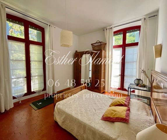 Maison bourgeoise en pierre avec jardin