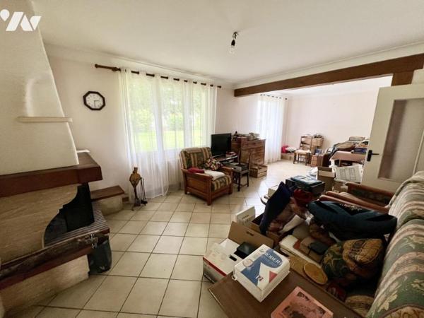 Maison 4 chambres + bureau avec jardin et garage