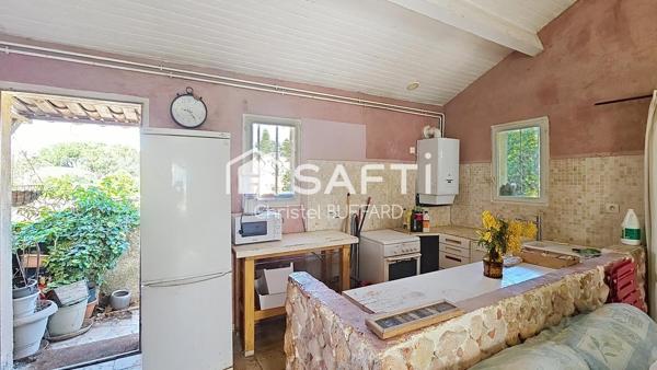 Petit immeuble à fort potentiel avec terrain constructible