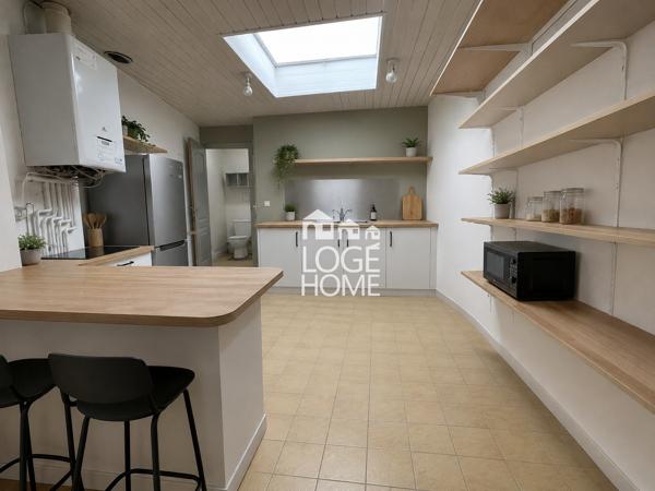 Maison- 4 chambres beau potentiel